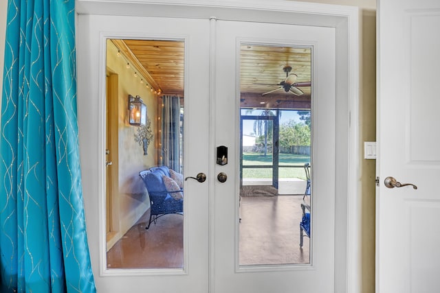 entryway featuring ceiling fan, french doors, and wood ceiling