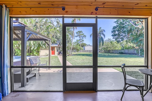 doorway featuring concrete floors