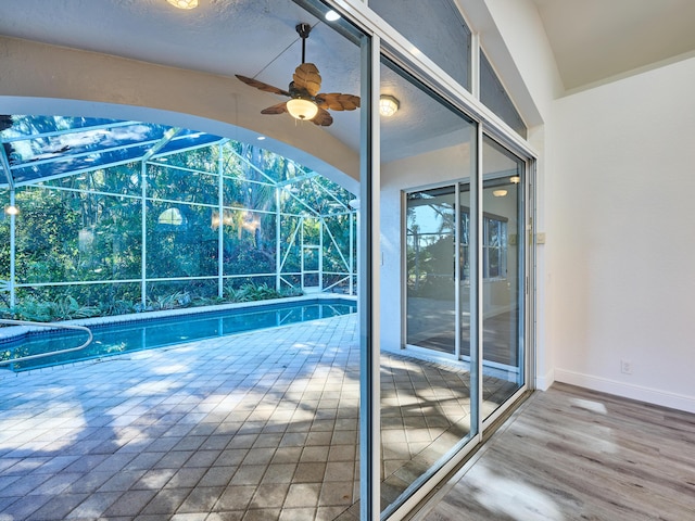 view of pool with ceiling fan