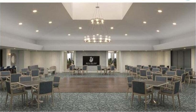 dining area featuring an inviting chandelier