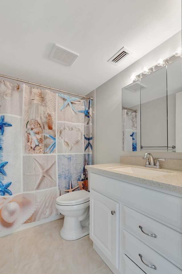 full bathroom with tile patterned flooring, vanity, toilet, and shower / bath combo