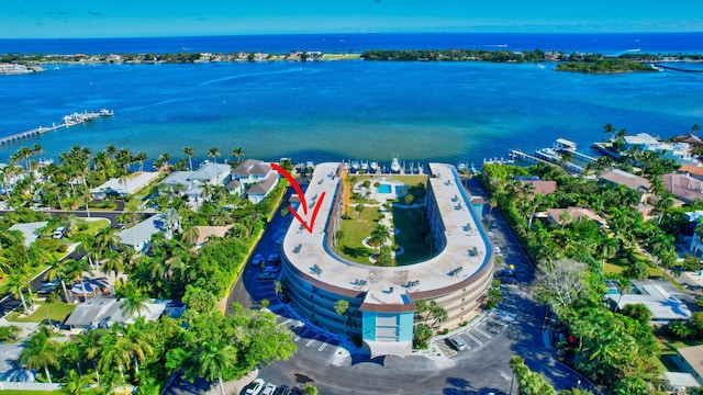 birds eye view of property featuring a water view