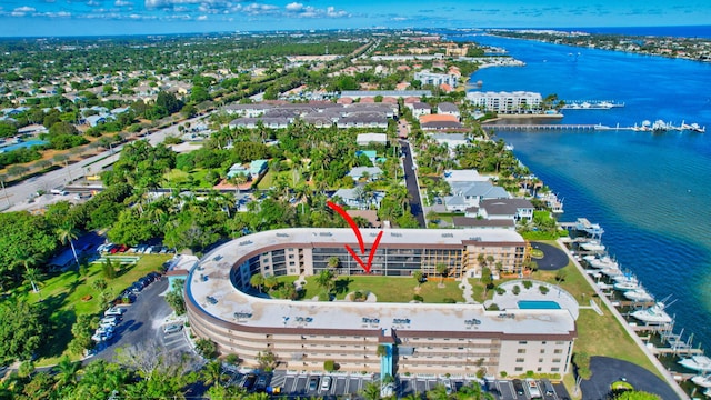 birds eye view of property featuring a water view