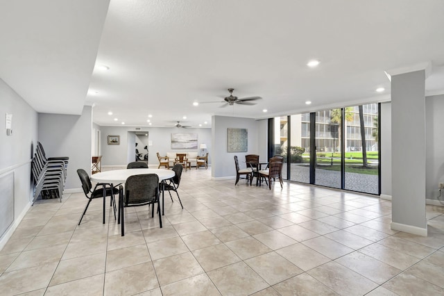 tiled dining space with ceiling fan