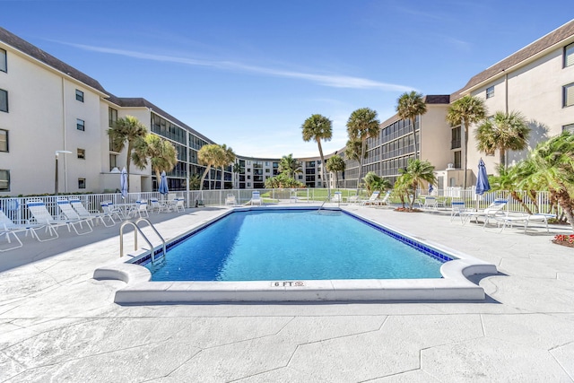 view of pool featuring a patio