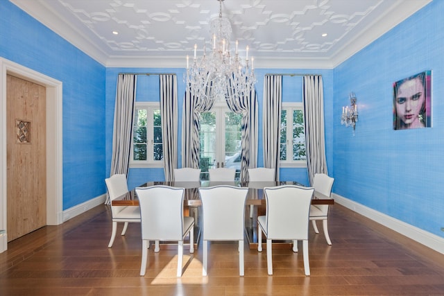 dining area featuring a notable chandelier, dark hardwood / wood-style floors, and ornamental molding