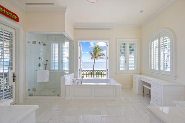 bathroom featuring ornamental molding, separate shower and tub, and a healthy amount of sunlight