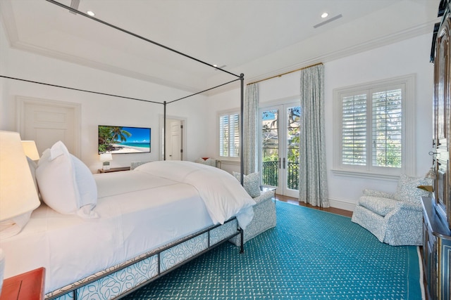 bedroom featuring access to exterior, crown molding, and french doors