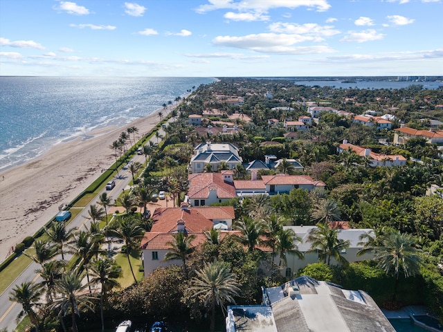 bird's eye view with a view of the beach and a water view