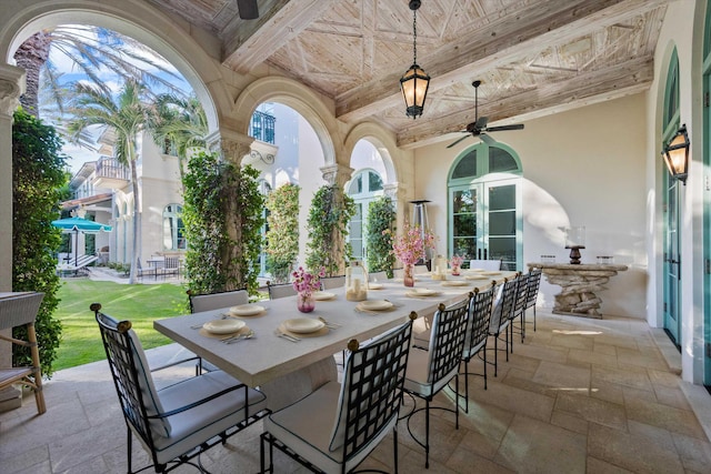 view of patio / terrace featuring ceiling fan