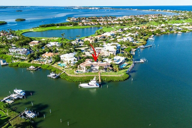 drone / aerial view with a water view