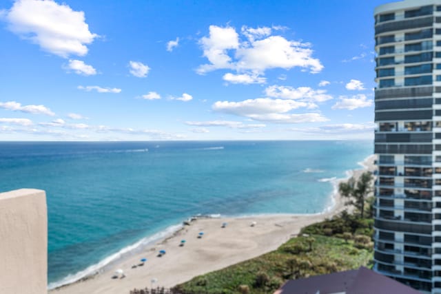 view of water feature with a beach view