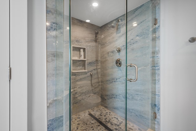 full bathroom featuring a stall shower