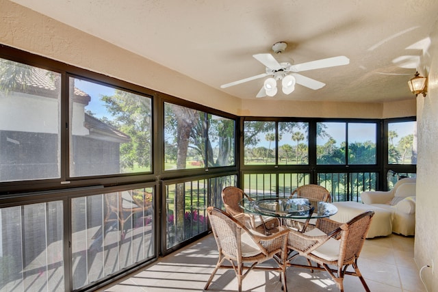 sunroom / solarium with ceiling fan