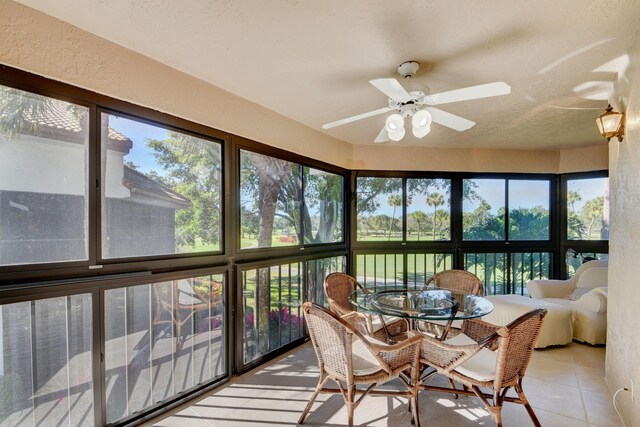 7230 Clunie Pl Unit 15403, Delray Beach, FL 33446 - sunroom with ceiling fan and outdoor dining area