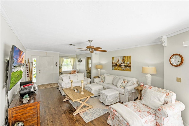 living room with ceiling fan, dark hardwood / wood-style flooring, and crown molding