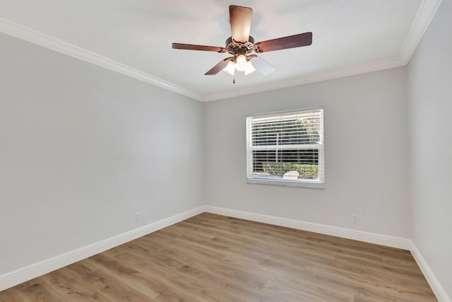 unfurnished room with hardwood / wood-style flooring, ceiling fan, and ornamental molding