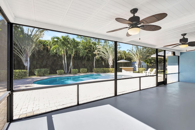 view of pool featuring ceiling fan