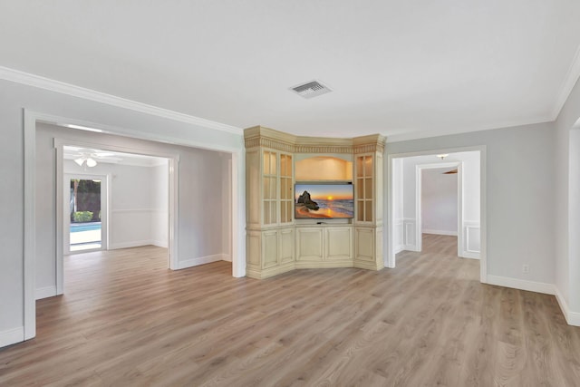 unfurnished living room with ceiling fan, light hardwood / wood-style floors, and ornamental molding