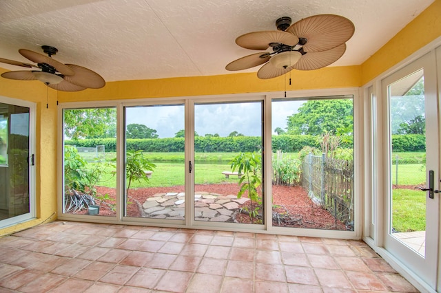 unfurnished sunroom featuring a healthy amount of sunlight