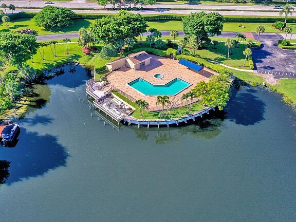 drone / aerial view featuring a water view