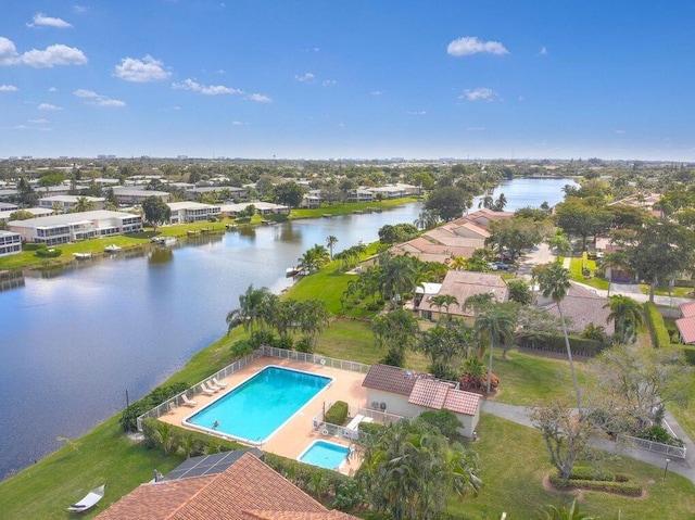 birds eye view of property featuring a water view