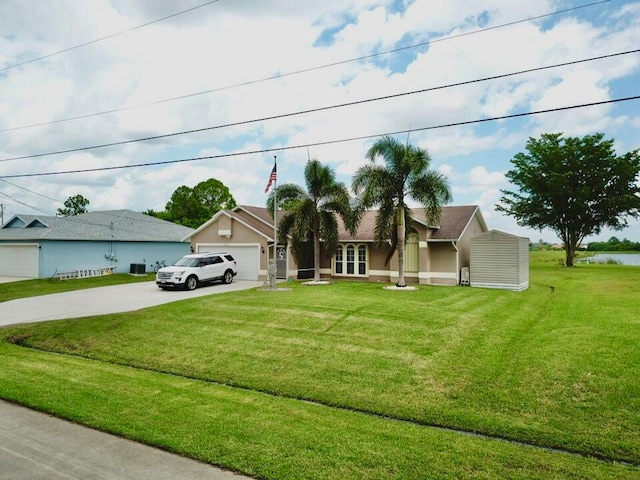 ranch-style house with a garage and a front lawn