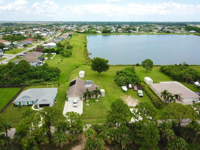 bird's eye view with a water view