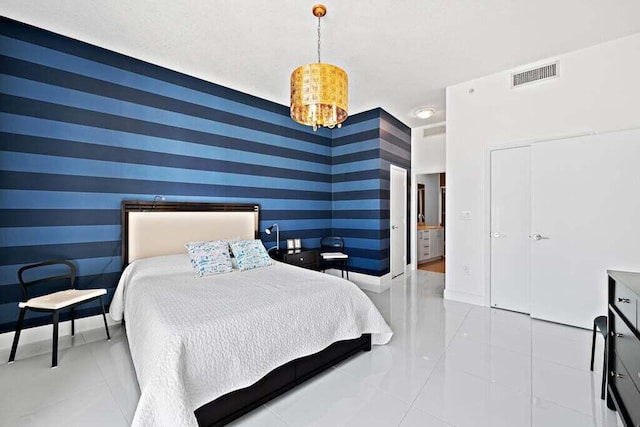 bedroom featuring light tile patterned floors