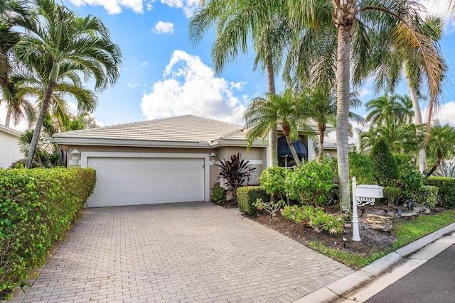 view of front of property featuring a garage