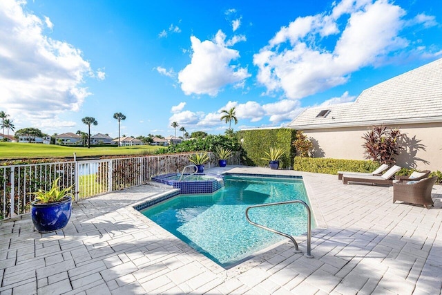 view of swimming pool with a patio and a water view