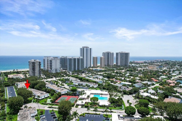 bird's eye view featuring a view of city and a water view