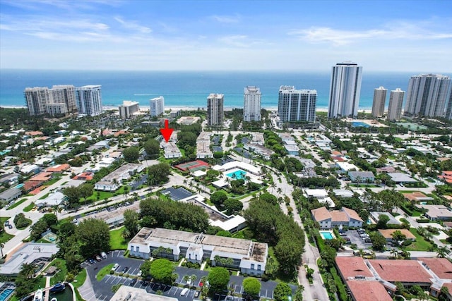 drone / aerial view with a view of city and a water view