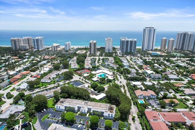 aerial view featuring a city view and a water view