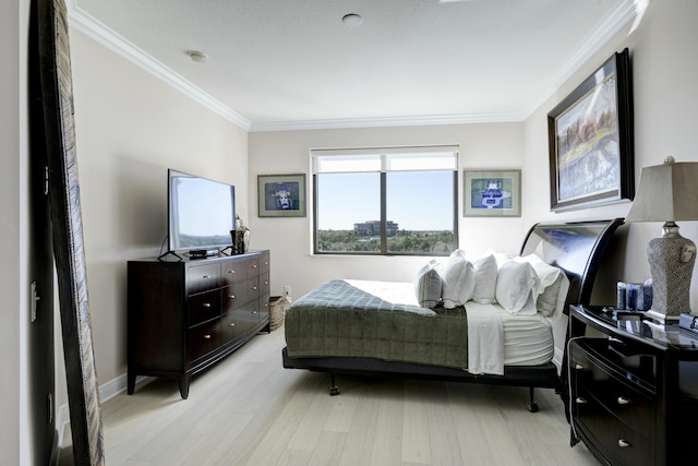 3610 Gardens Pkwy Unit 503A, Palm Beach Gardens, FL 33410 - bedroom with crown molding, baseboards, and light wood finished floors