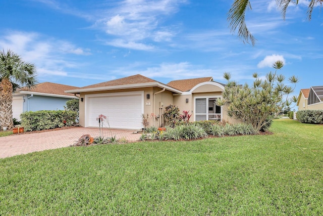 single story home with a front lawn and a garage