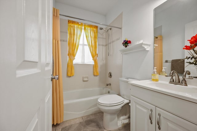 full bathroom featuring tile patterned floors, toilet, vanity, and tiled shower / bath