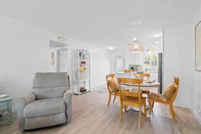 dining area featuring light hardwood / wood-style floors