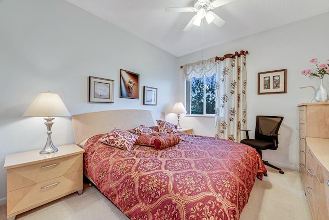 bedroom with light colored carpet and ceiling fan