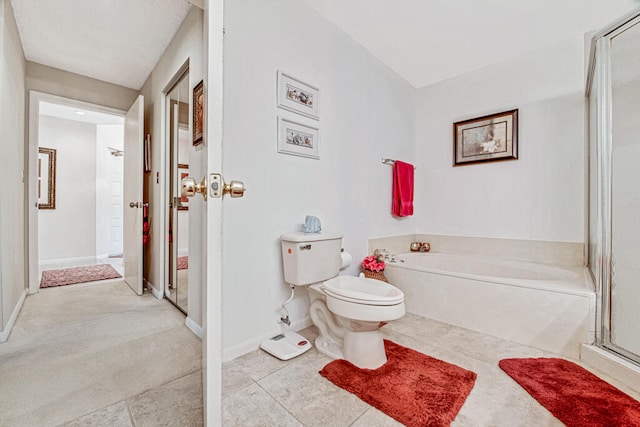 bathroom with tile patterned flooring, toilet, and plus walk in shower