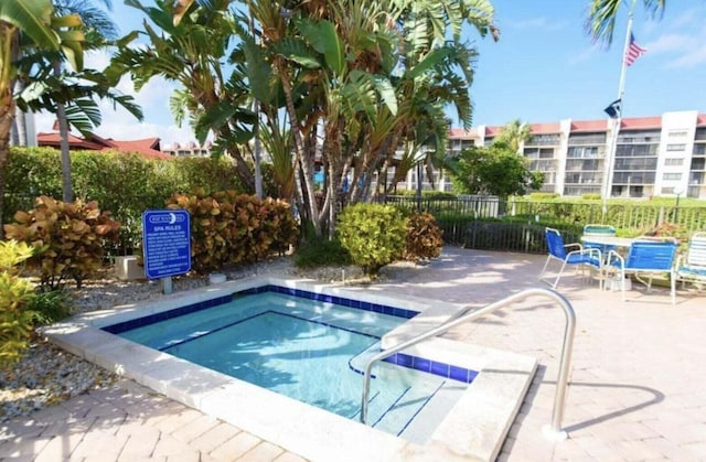 view of pool featuring a patio area