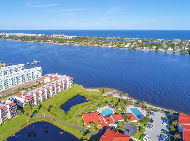 bird's eye view with a water view