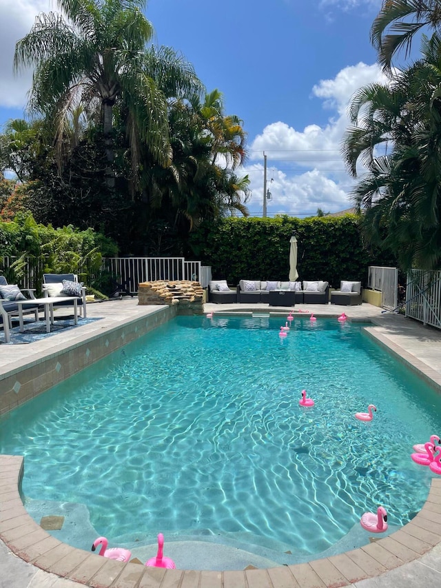 view of pool featuring a patio area