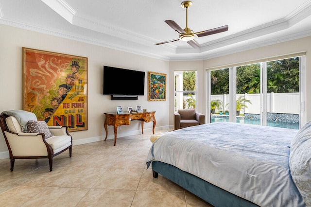 tiled bedroom featuring ceiling fan, a raised ceiling, crown molding, and access to outside