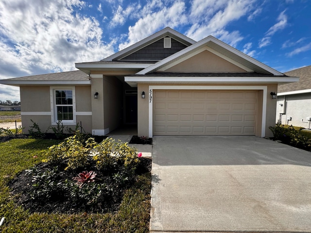 view of front of property with a garage