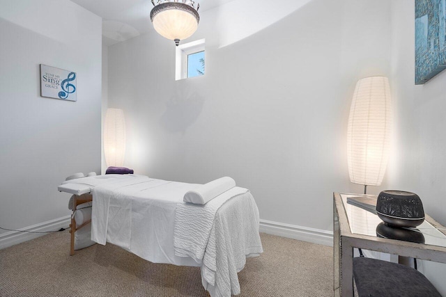 bedroom with light colored carpet