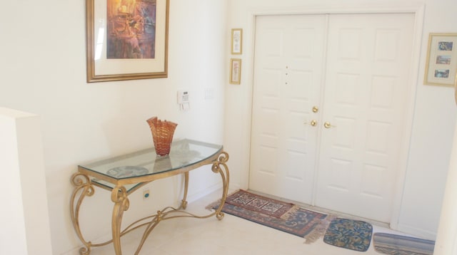 view of tiled entrance foyer