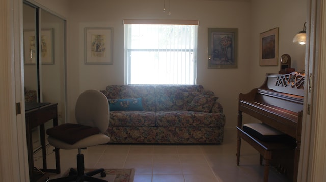 living room with light tile patterned flooring