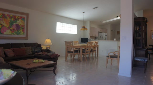 living room featuring light tile patterned floors