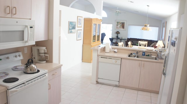 kitchen with white appliances, vaulted ceiling, sink, pendant lighting, and light brown cabinets